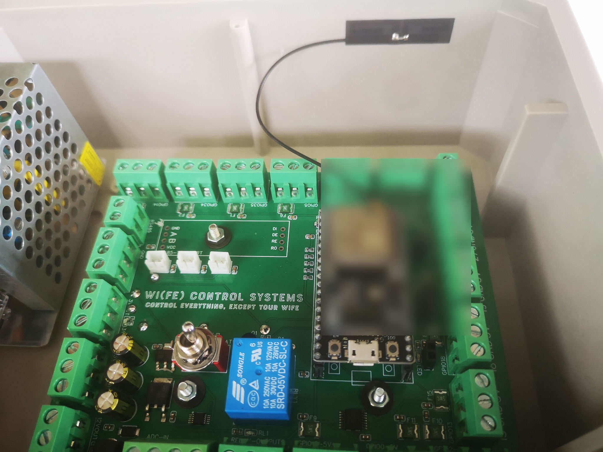 Top-down view of WiFe Control Systems custom embedded control board in enclosure